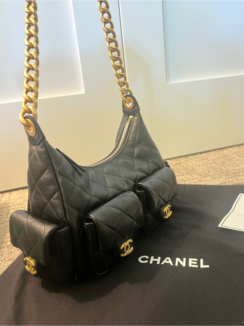 CHANEL Black Quilted Leather Hobo Bag with Gold Chain